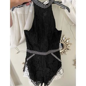 Size S black &white lace romper with key hole back